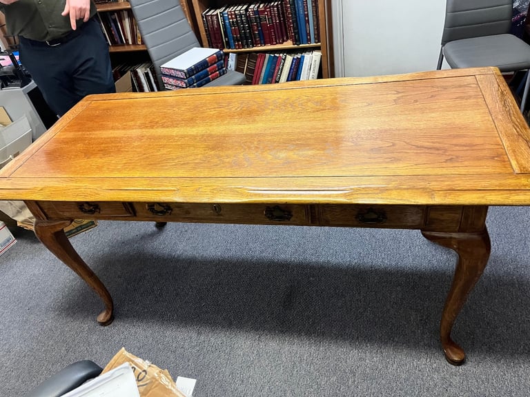 Antique wooden desk with three drawers 