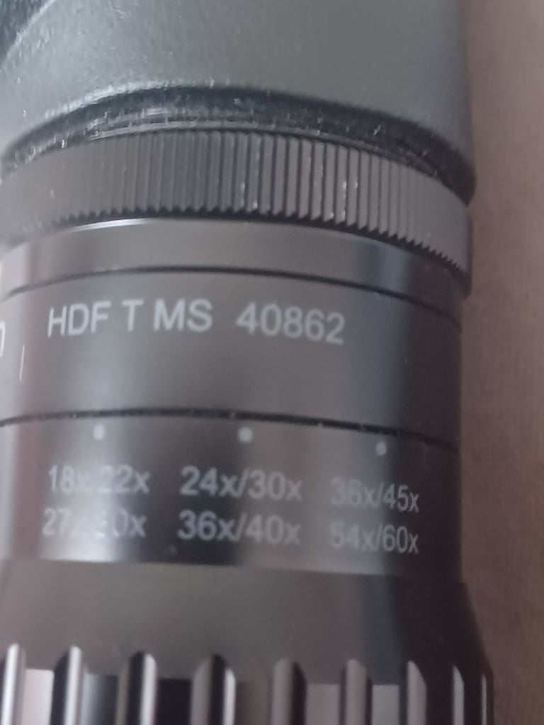 Optricon travelscope and zoom lens