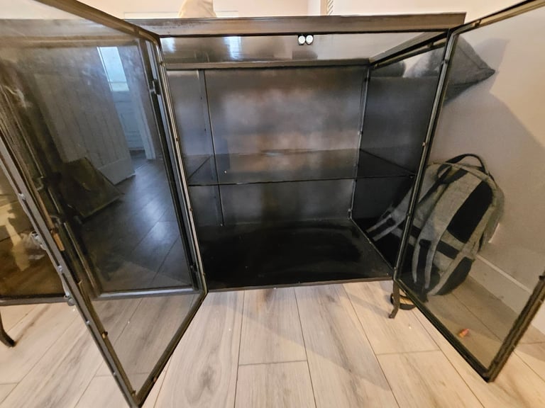 Black glass industrial sideboard.