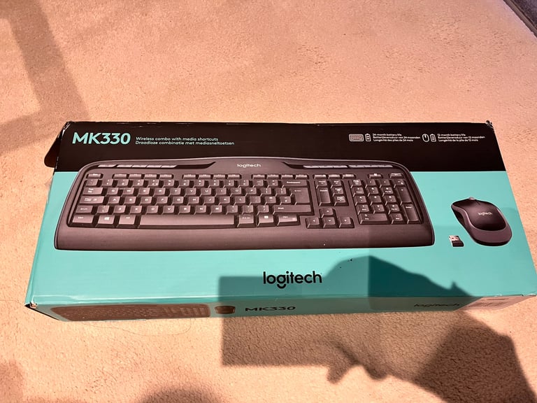 Brand new Logitech wireless keyboard and mouse set