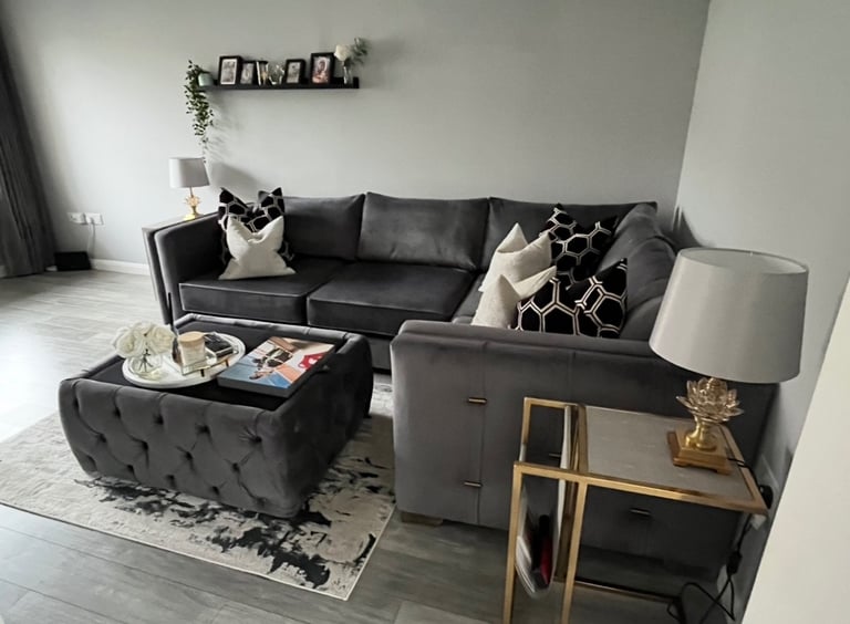 Grey velvet corner sofa and table 