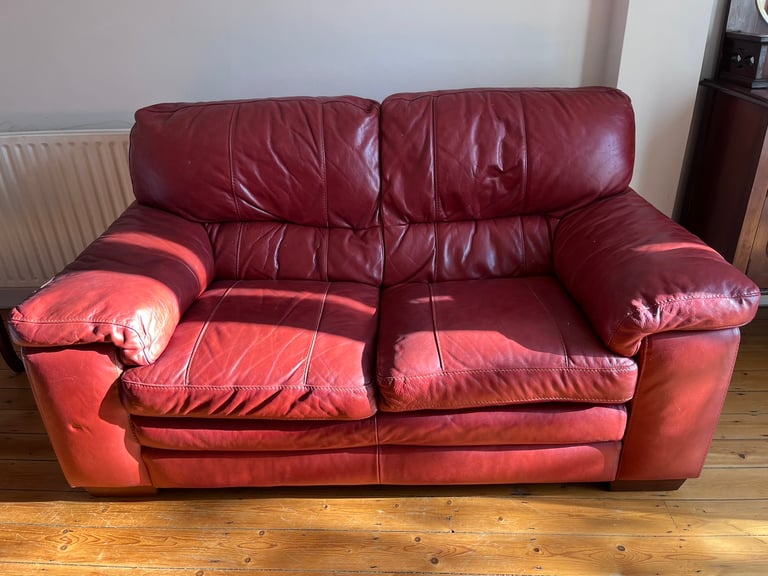 Red leather 2 seater sofa 