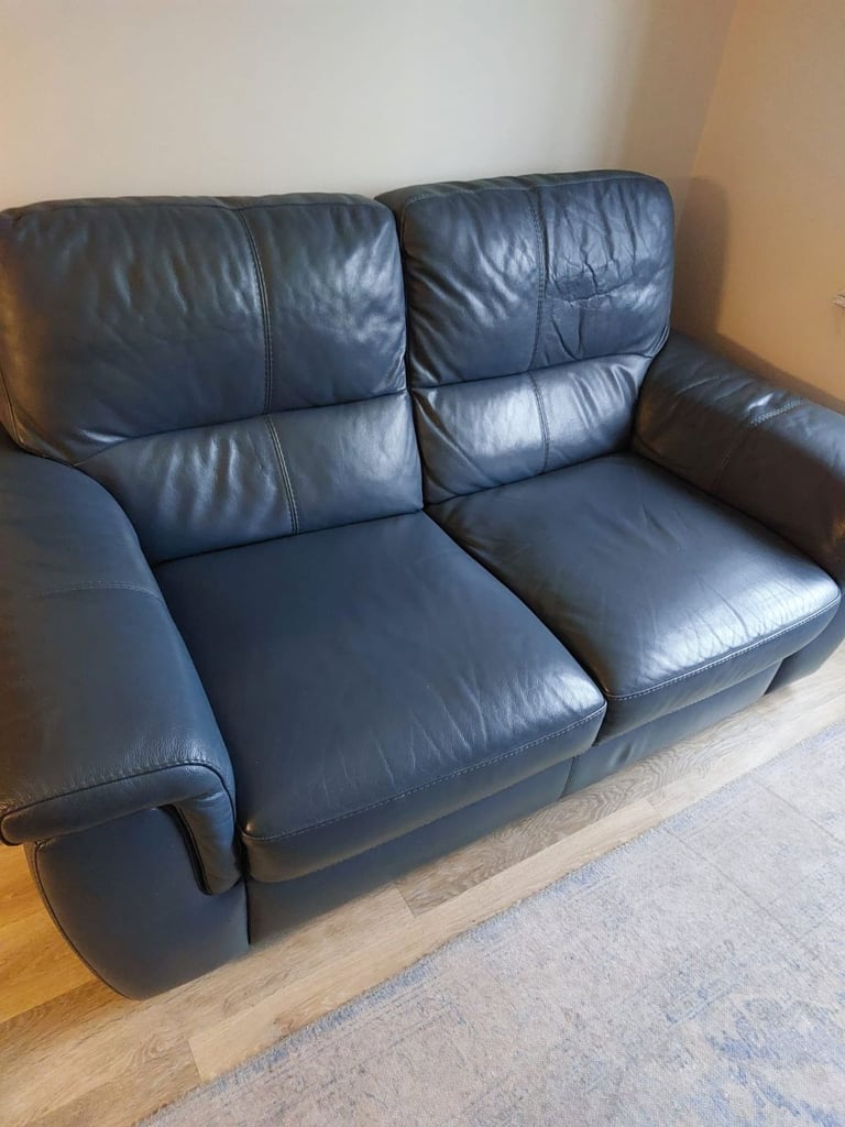 DFS -Denim Blue Leather suite with electric recliner and foot stool
