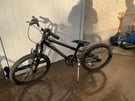 Boys probike black with green writing 24 inch