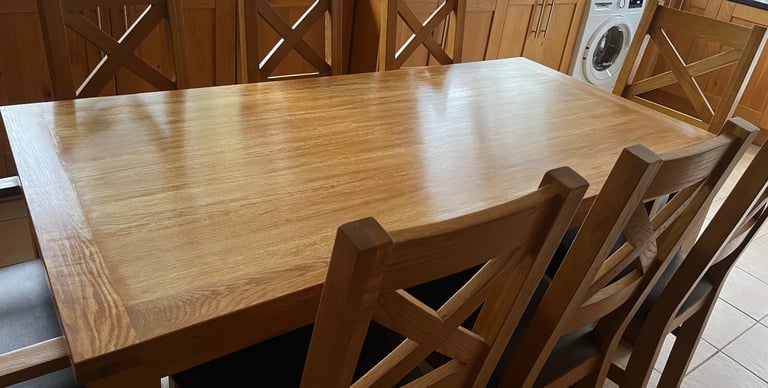 Solid Oak 8 seater table and chairs 