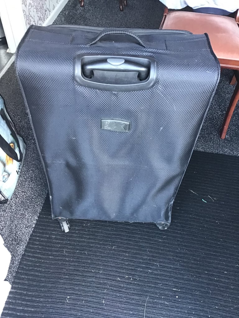 Used Lightweight large suitcase 28” long 18”wide 10”depth  Good for Storage or holidays