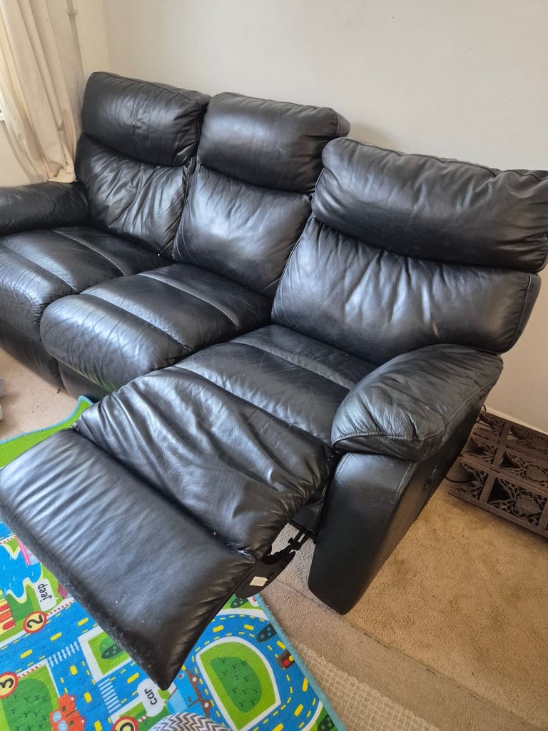 Black leather reclining 3 seater sofa 