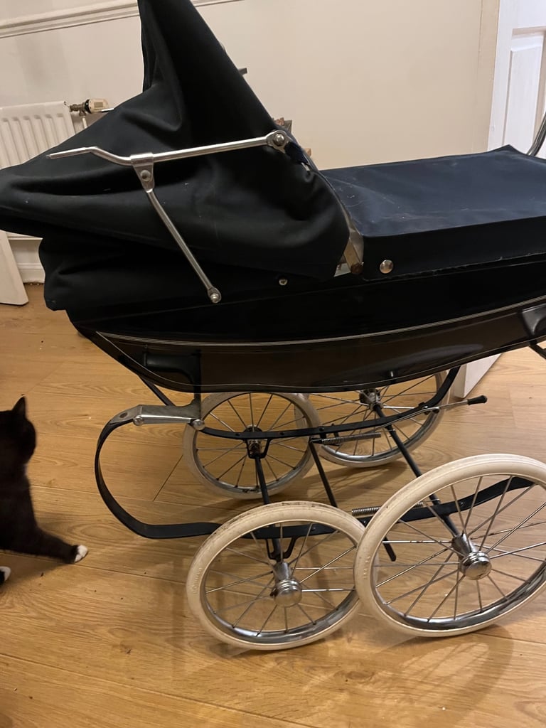 Children’s silver cross pram