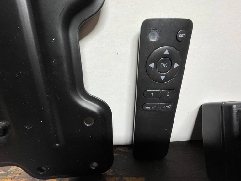Tv remote wall or ceiling bracket 