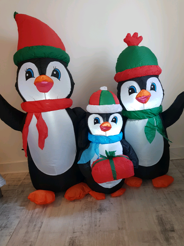 Inflatable penguin family