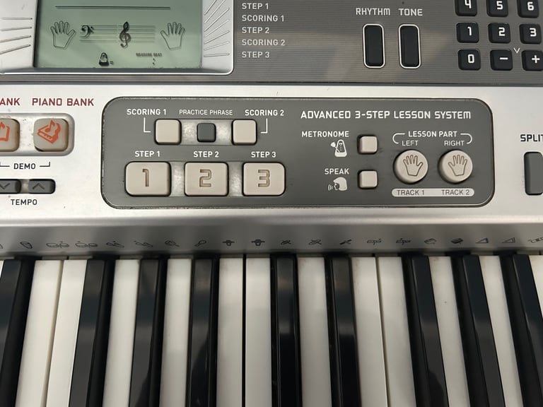 Casio Keyboard and Stand, with Learn to Play Function