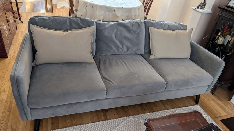 Blue velvet sofa