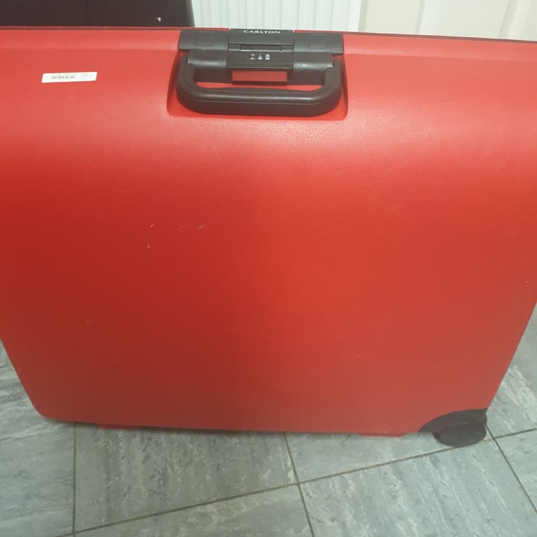 CARLTON - RED HARD SHELL SUITCASE