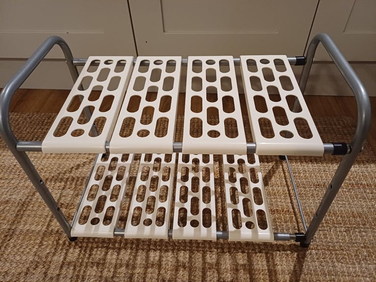 Adjustable storage rack for under kitchen sink