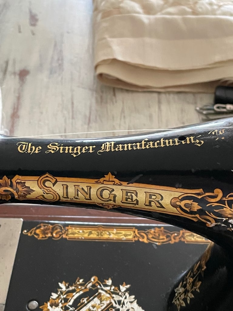 Vintage hand cranked singer sewing machine 