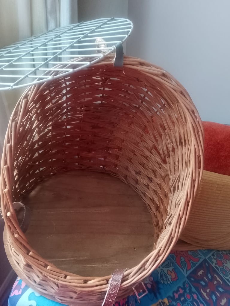 Wicker cat bed/cage.