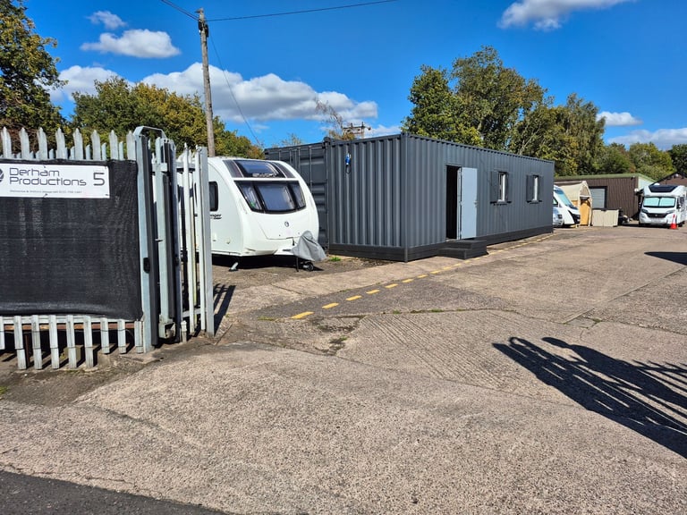 Secure office unit with open storage/ parking area