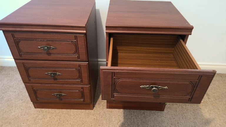 A matching pair of bedside cabinets with 3 drawers in each