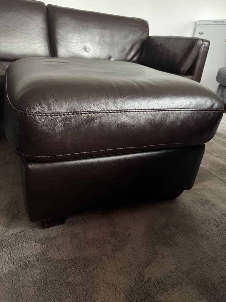 2 Seater leather sofa and puffer table 