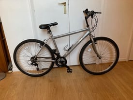 TRAX TR1 MTB. Gents silver 19" frame, good 26x1.95 tyres on alloys, 18 Shimano gears, V brakes 