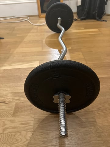 Ez curl bar x 10kg cast iron plates in Kennington, London