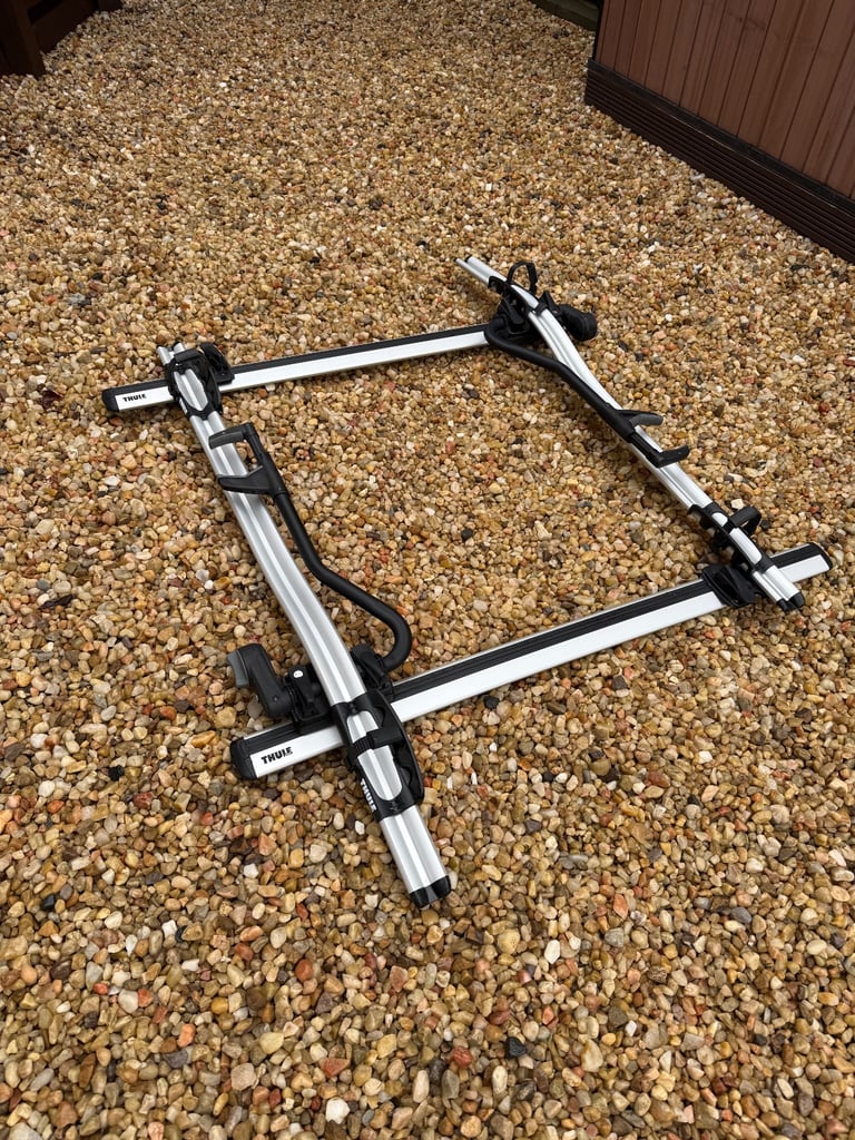Thule evo roof bars with 2x bike racks. 