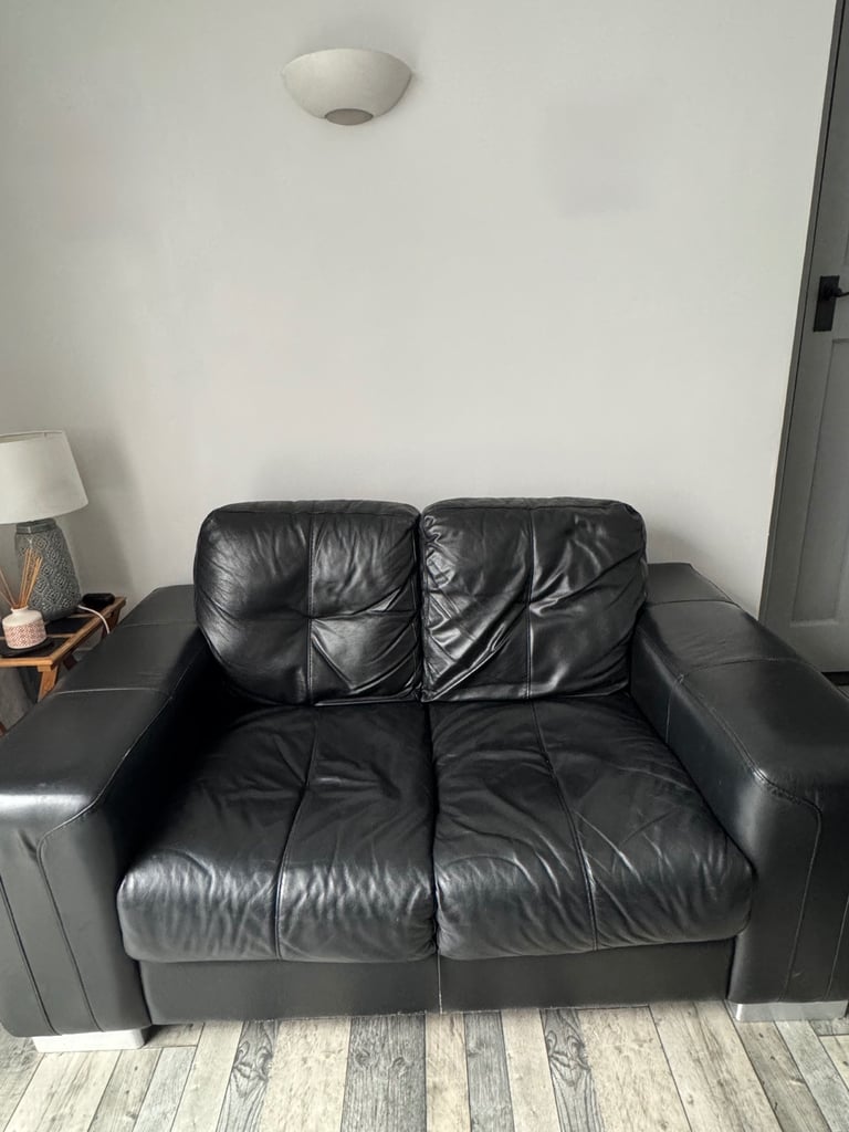image for Two leather sofas 3+2 Seaters and footstool 