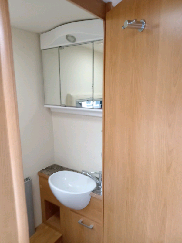 Buccaneer Caravel 2011 unused for 2 years) 4 berth fixed island bed caravan