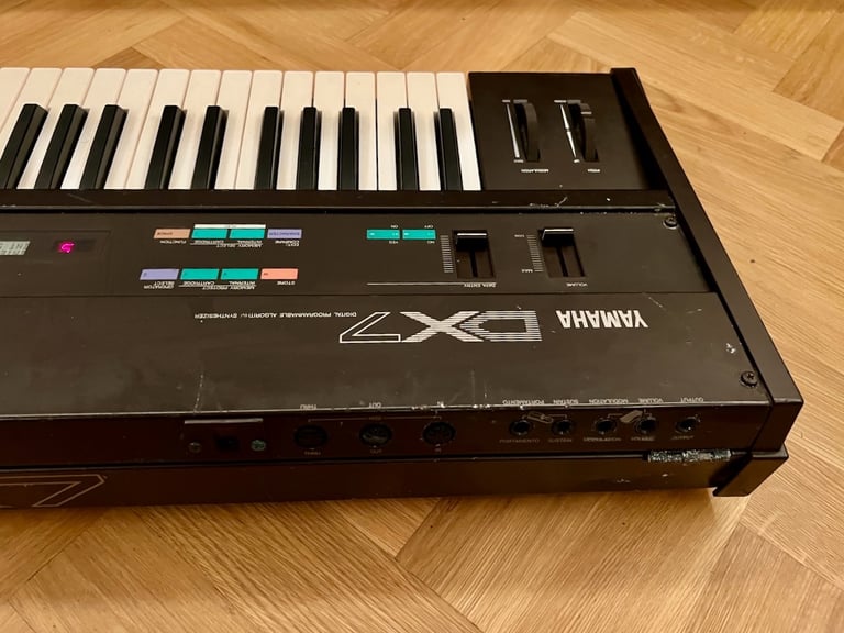 Yamaha DX7 Synthesizer Mk1 with original stand, soft case and manual.