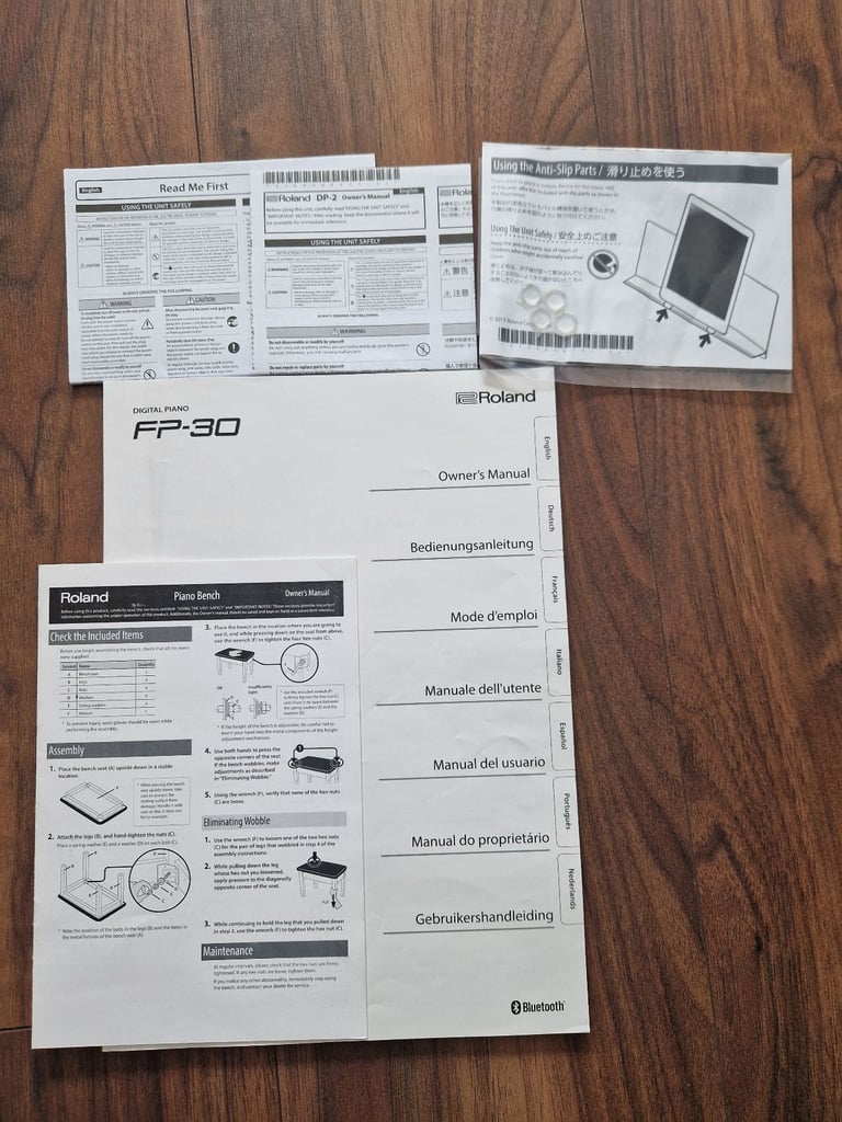 Roland FP-30 piano keyboard with a stand, Roland bench, pedal, professional headphones, cover, books