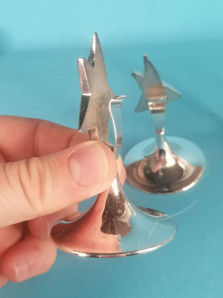 Stainless steel STAR PLACE CARD HOLDER. As seen.