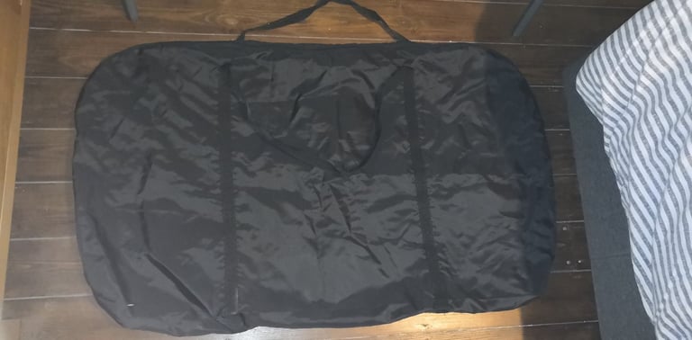 Maxi Cosi Iora next to me cot