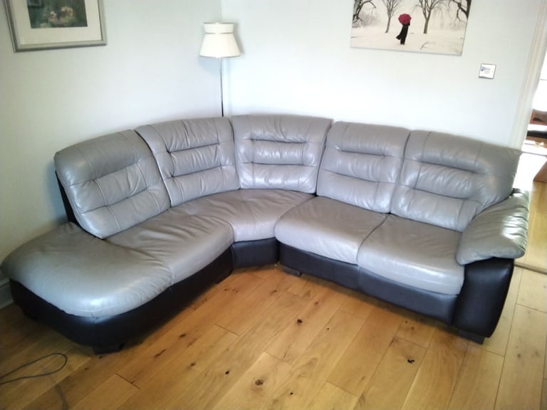 Black and grey leather corner unit.