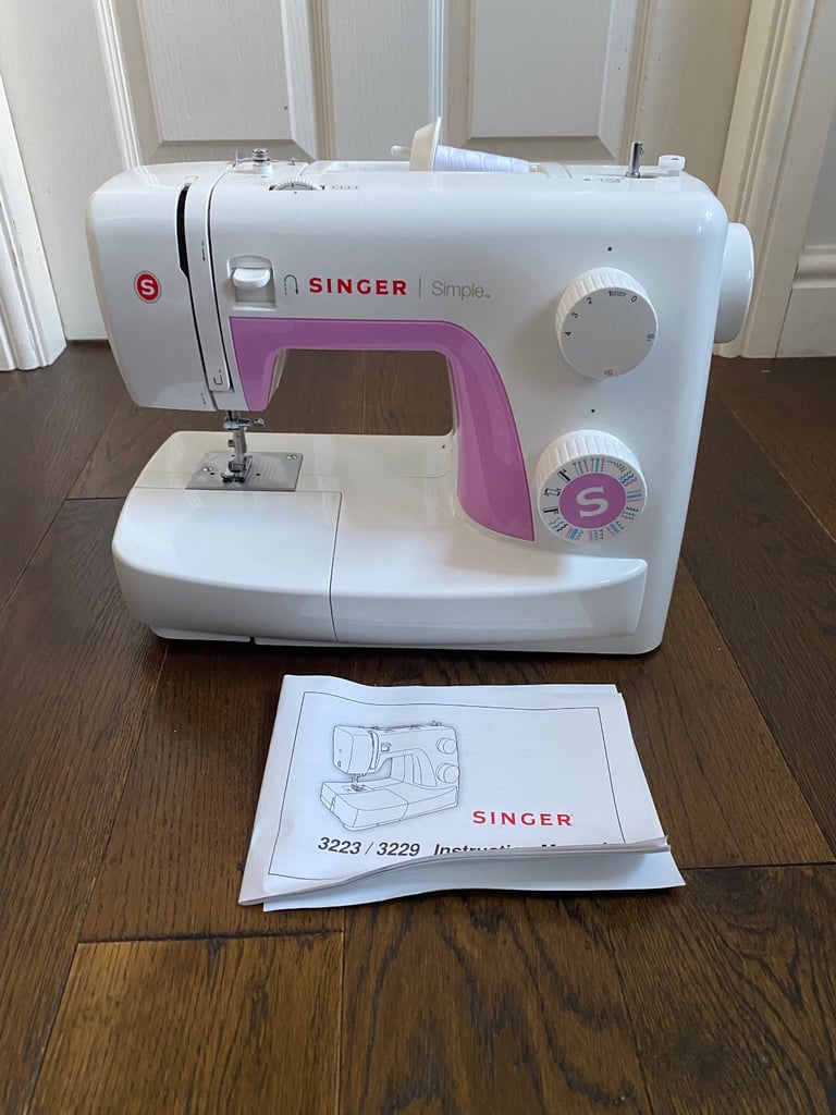 image for Singer Sewing Machine- Simple 3223. Great present idea.