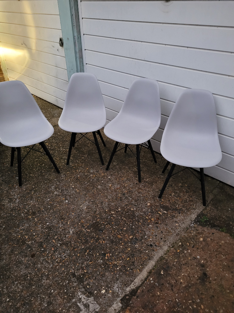 x4 Eiffel Style Plastic Dining Chair good condition and solid