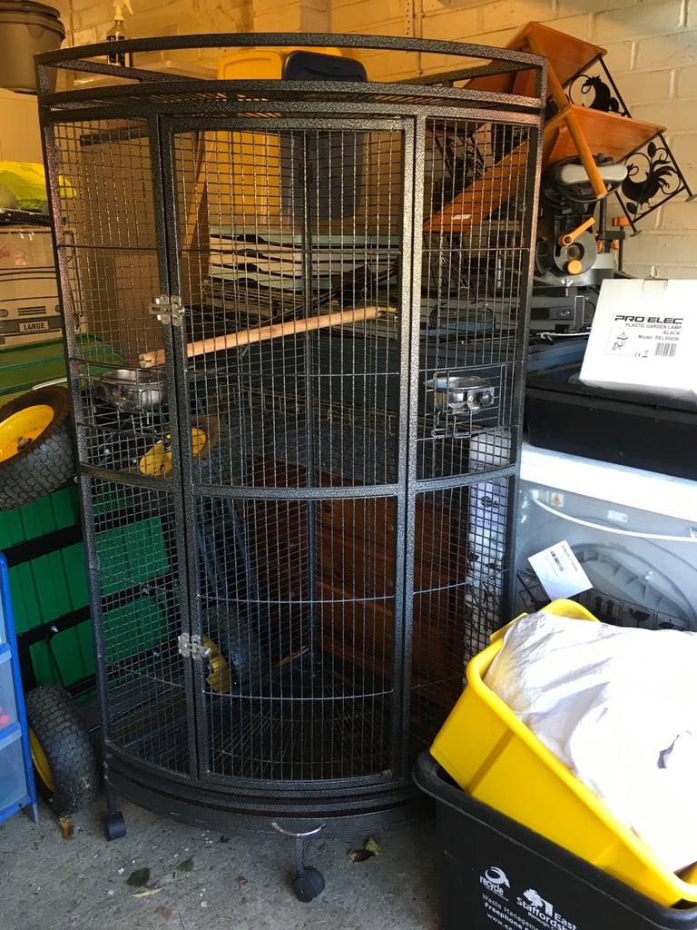 Large corner parrot cage.