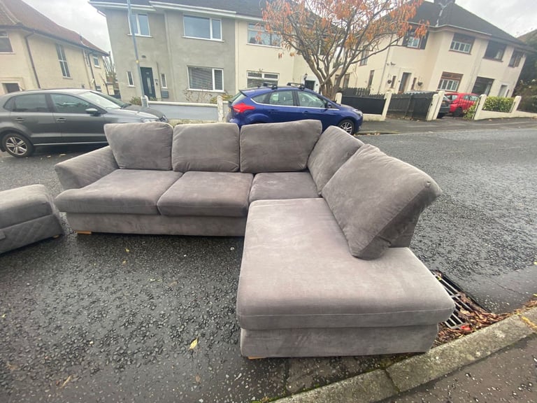 Corner group sofa in a quilted fabric with matching ottoman footstool   Only £199