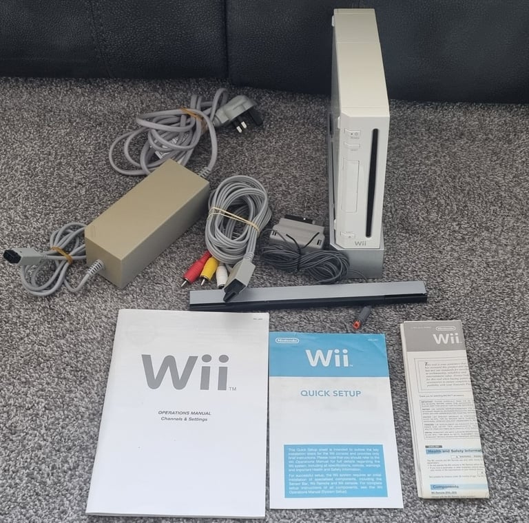 Wii + 6 games Inc mario kart & wii sports 
