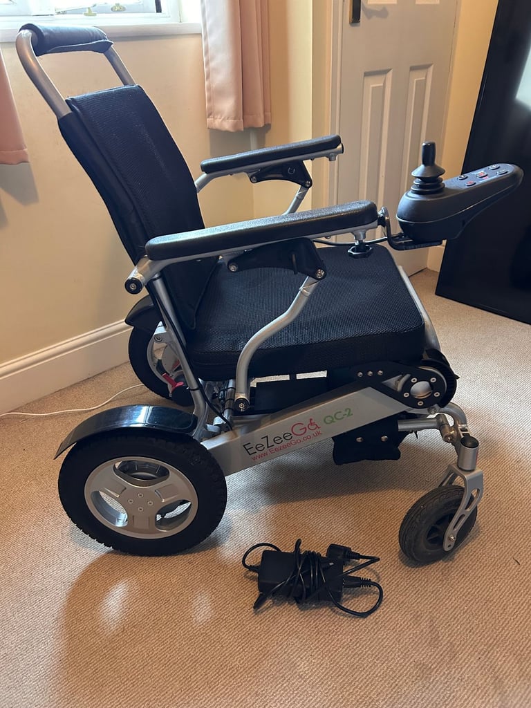 EeZeeGo QC-2 Portable Electric Wheelchair including rechargeable batteries and charger