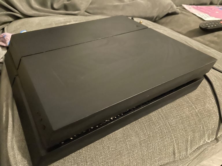 PlayStation 4 with controller 
