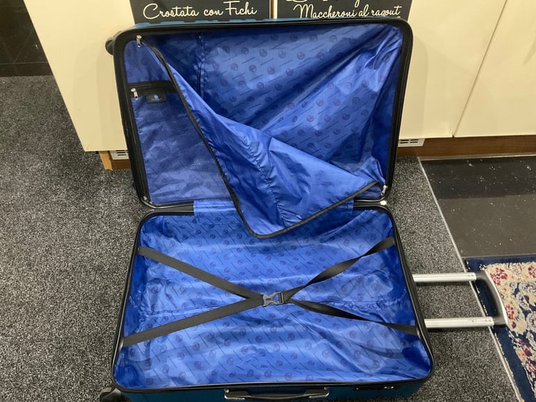 Used suitcase ATLASBAGS size 75x48x£29cm blue 4 wheels v.good condition £28