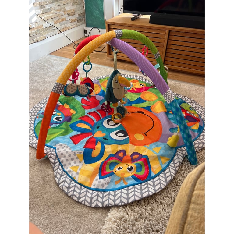 image for Baby play mat with lots of dangling toys 