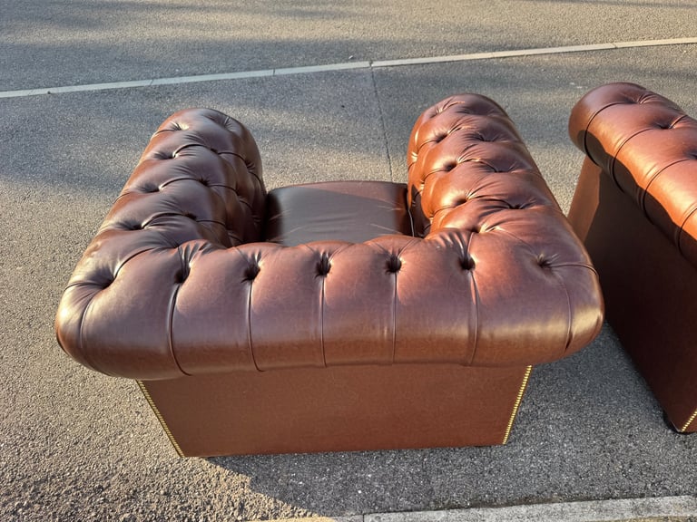 Pair of chesterfield faux brown leather club armchairs 