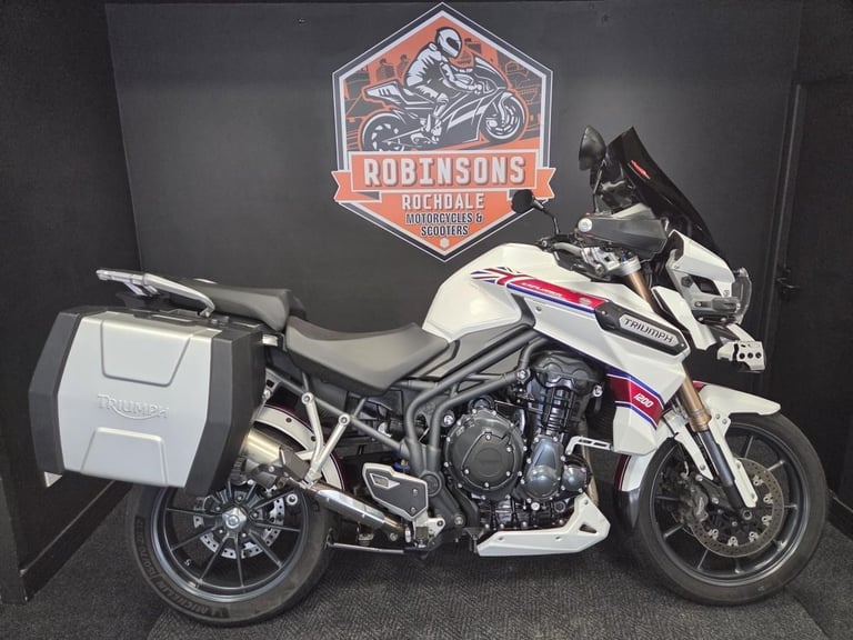 2013 Triumph Tiger Explorer 1215 in white with luggage.
