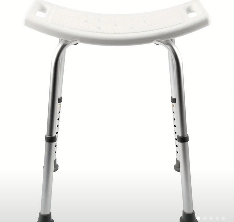 Adjustable shower seat