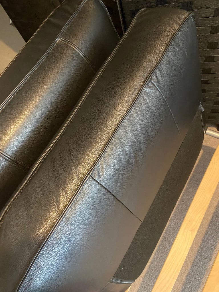2 firm decorative leather pillows.