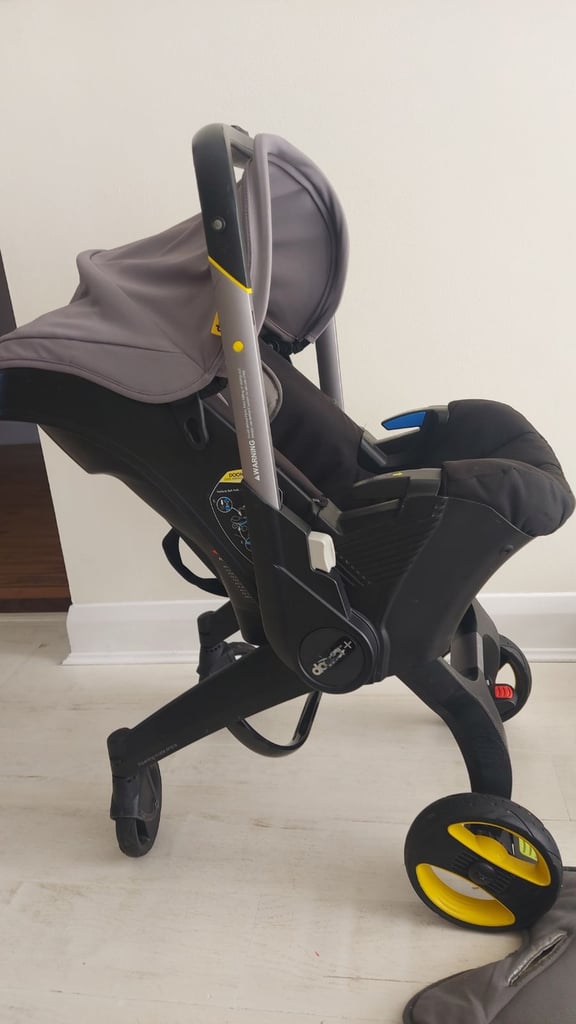 Doona pushchair car seat buggy travel school trips a must have, rain cover,isofix,nappy bag,