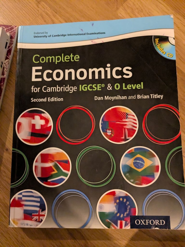 IGCSE economics book with CD - unused