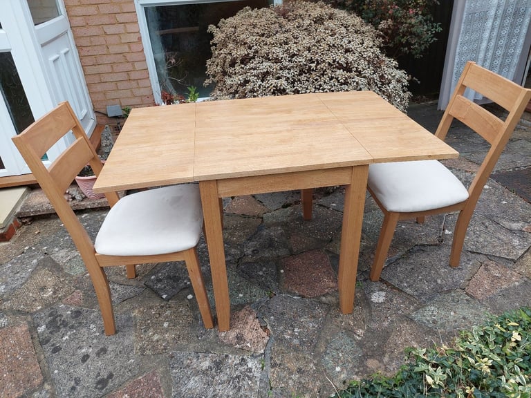 image for Wooden extendable dining table and 2 chairs