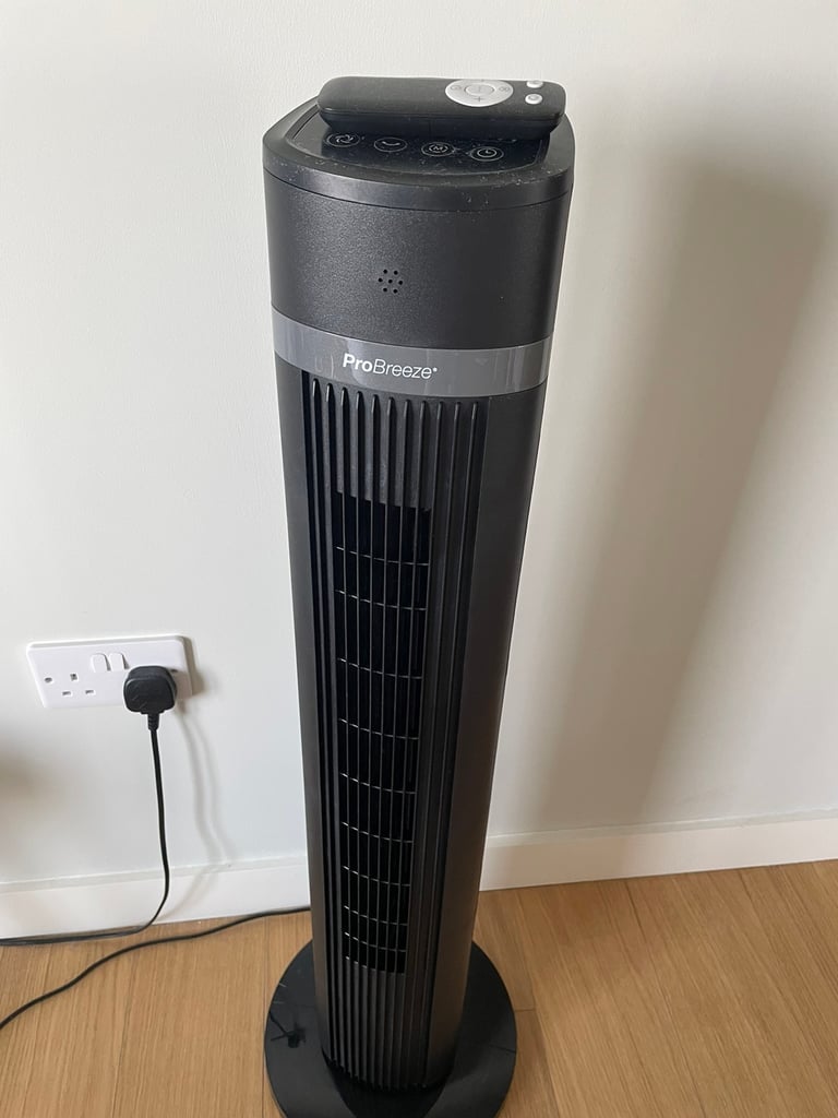 Oscillating tower fan with a remote control 